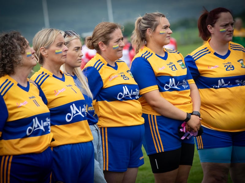 Wolfhounds (Limavady) standing for the National Anthem on Saturday.