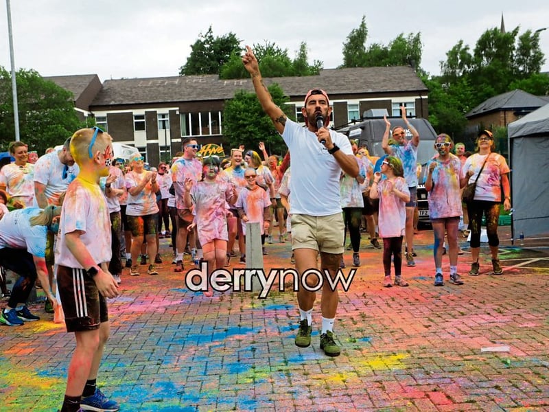 Local celebrity Mickey Doherty leading the “warm-up” belting out ‘YMCA”.