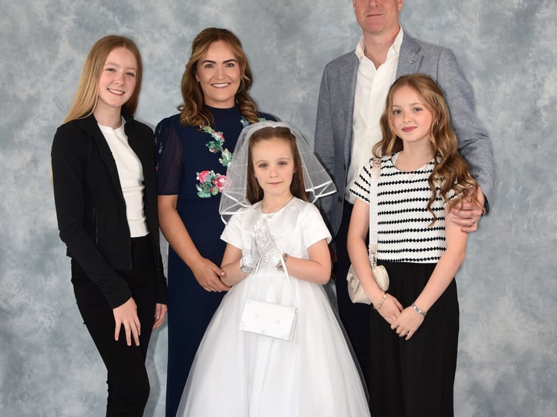 The Mullan family on First Communion day