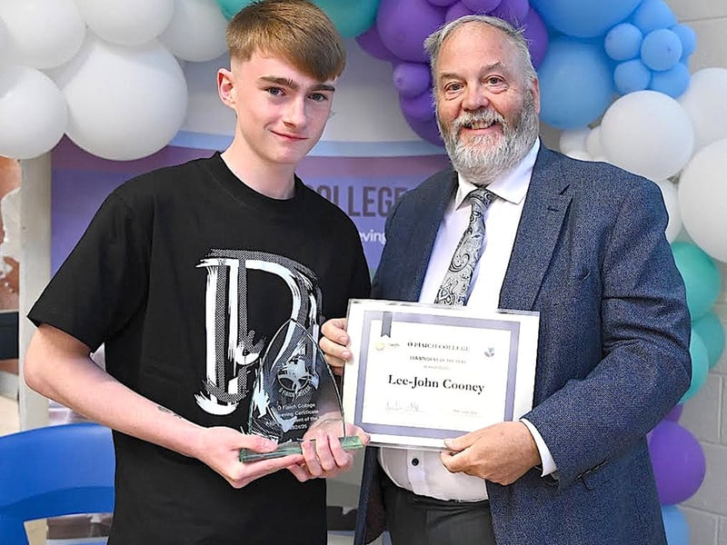 Below: Lee-John Cooney, LCA Student of the Year receiving his award from Principal Padraig McGovern