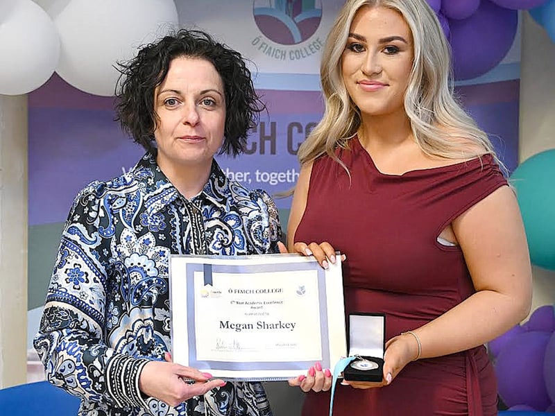 Below: Academic Excellence award winner Megan Sharkey receiving her award from Deputy Principal Audrey Flood