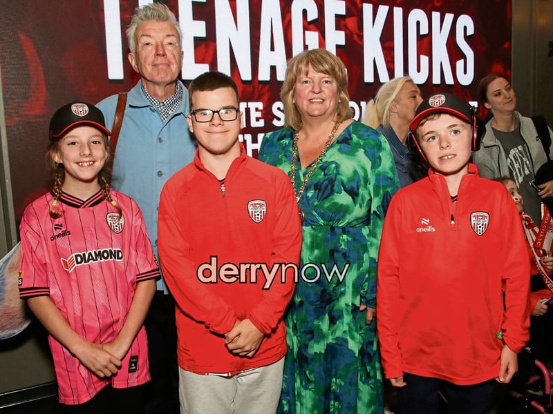 Deputy Mayor Niree McMorris and Undertones bass guitarist Mickey Bradley with pupils from Ardnashee College who feature in the film “Teenage Kicks”, by the late Vinny Cunningham at Brunswick Moviebowl. Included are Ila Kyle, Blake McCauley and Cian Healy.
