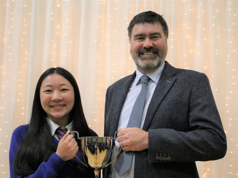 Below: Maurice Woods presents The Senior Agricultural Award to Shuxin Ellis Wang