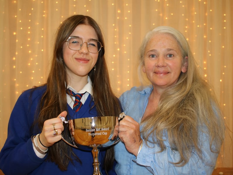 Below: Leanne Mullen presents The Senior Art Award to Aimee Gartlan