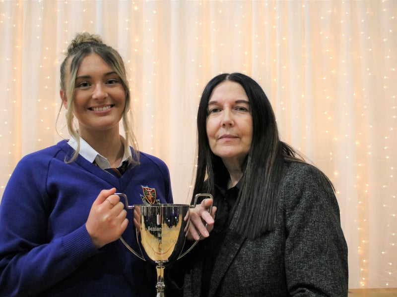 Below: Mary Howley presents The Senior Business Award to Keelan Bewley