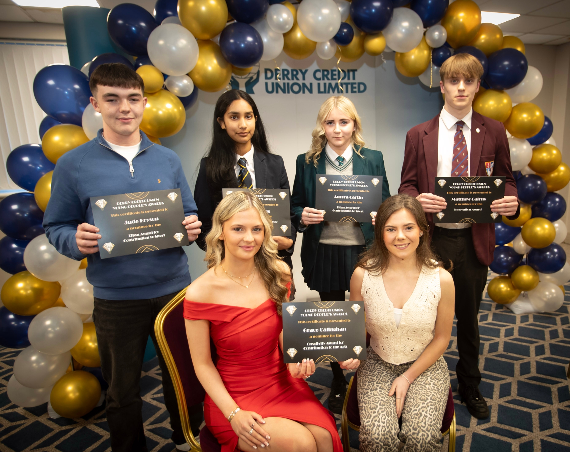 Derry Credit Union's Young People's Awards 2025 nominees being presented with their certificates by Sarah Doherty, Youth Committee, on Monday night. At front is Grace Callaghan. Back from left, Jude Bryson, Anya Ashok, Aurora Cartin and Matthew Cairns. (Photos: Jim McCafferty Photography)