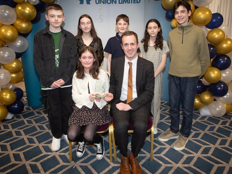 Derry Credit Union's Annual Young People's Awards 2025 winners receiving their prizes at the Waterfoot Hotel on Monday evening last from Owen McColgan, Keynote Speaker.