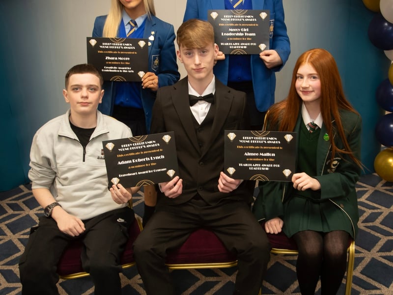 Derry Credit Union's Young People's Awards 2025 nominees being presented with their certificates by Gary McLaughlin, Youth Committee, on Monday night. At front are Adam Roberts-Lynch and Aimee Mallon. At back are Zhara Moore, and a representative of Mercy Girl Leadership Team.