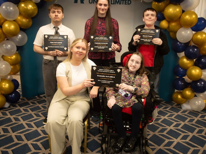 Derry Credit Union's Young People's Awards 2025 nominees being presented with their certificates by Rionach Barr, Youth Committee, on Monday night. At front is Seanain McCallion, and back from left, Cian McConnell, Hannah McMorris and Jacob O'Kane.