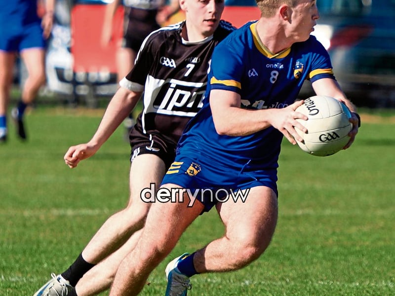 Steelstown's Karl Doherty. On his heels Dungiven Niall McKeever.