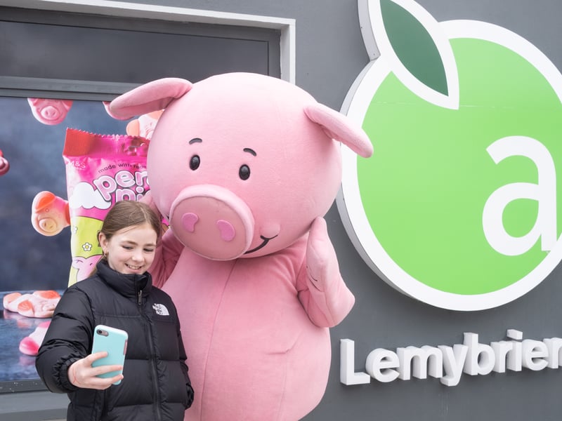 Percy Pig pictured with Helene Farrell from Abbeyside pictured at the launch of Applegreen Lemybrien with M&S Food.