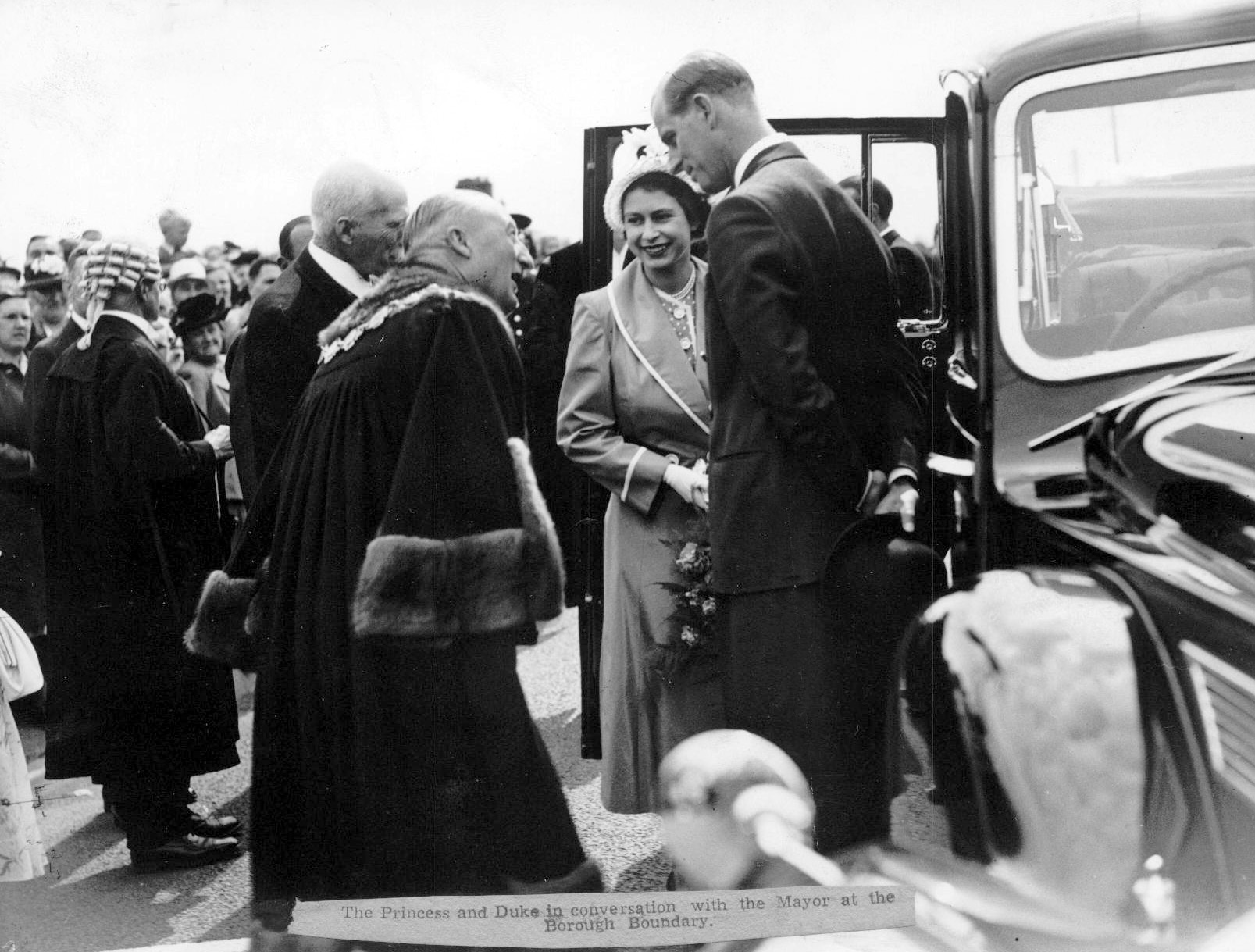 Princess Elizabeth and Prince Philip (the Duke of Edinburgh) during a visit to the Royal Show at Sundorne, Shrewsbury, in July 1949. The Princess, later Queen Elizabeth II, is pictured in conversation with the Mayor at the borough boundary.