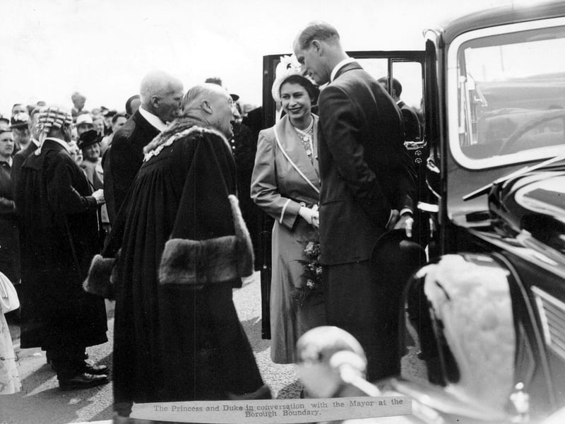 Princess Elizabeth and Prince Philip (the Duke of Edinburgh) during a visit to the Royal Show at Sundorne, Shrewsbury, in July 1949. The Princess, later Queen Elizabeth II, is pictured in conversation with the Mayor at the borough boundary.