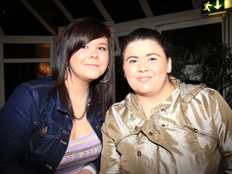 Caption: Amanda McGonigle and Michelle Moore wait for Nathan to take to the stage