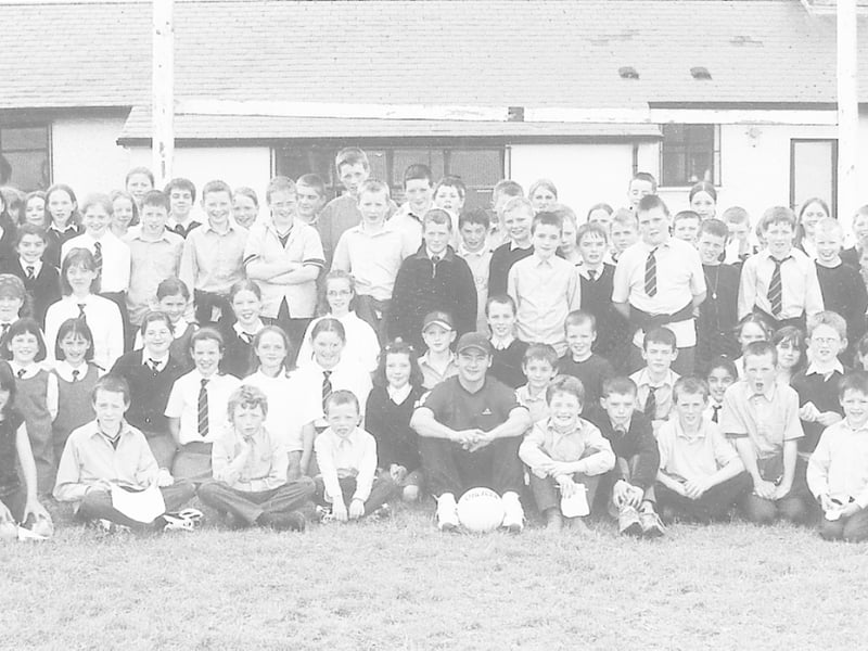 Caption: Dublin GAA star Jason Sherlock is pictured with pupils from St Emer’s National School where he attended to promote GAAs Summer Camp programme Picture: Joe McDonagh