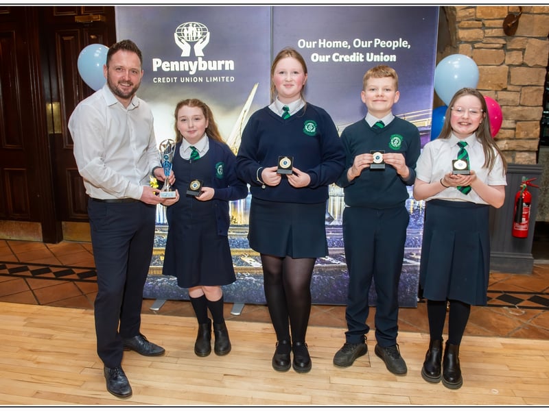 Winners of Competition A: St Patricks P.S, Shamrock Superstars. From left to right – Frank Doherty (Pennyburn Credit Union Manager), Aine, Aiyana, Darragh and Anna.