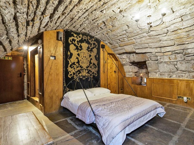 As the castle unfolds across its upper levels, each floor reveals its own distinct personality with six beautifully appointed bedrooms.