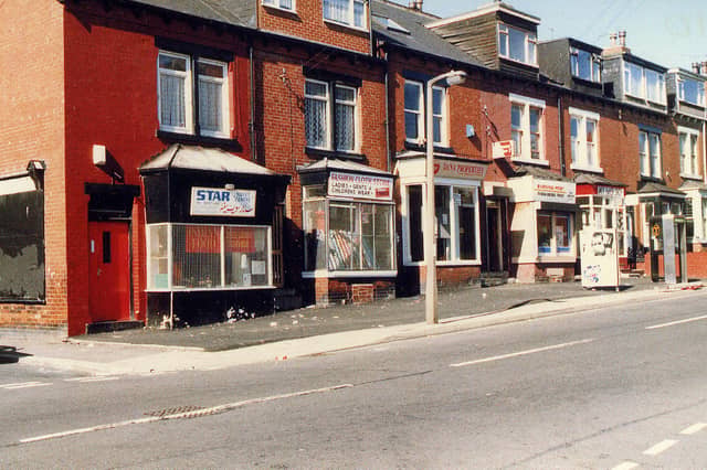 A row of shops and houses on Tempest Road between the junctions with Maud Avenue, left, and Stratford Street in 1989. The first shop on the left, Star Sweet Centre was previously Heslington's baker. Next to this is the Fashion Cloth Store, then followed by Dana Properties and a newsagent.