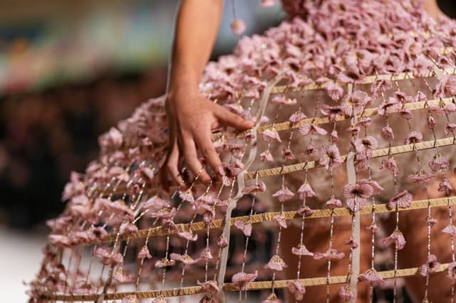 Chuiri’s use of transparent organza, broderie anglaise and lace attached to cage-like crinolines with streaming ribbons showcased a naïve rawness – as if the models had been caught playing dress up.
