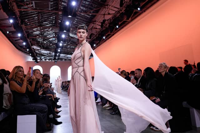 Capes were peppered throughout the collection – a style that has been discernible at this years’ haute couture week – but they were elevated in the form of sequin-studded organza.