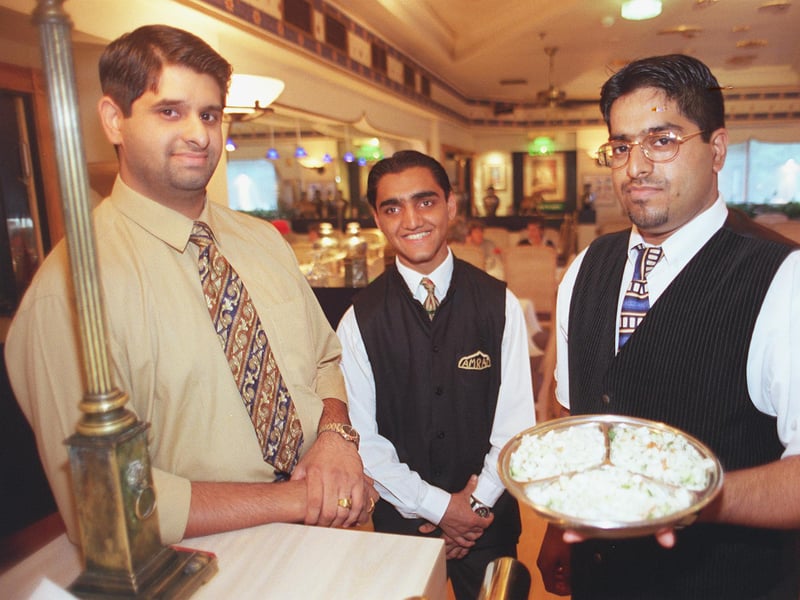 Manager Nadeem Majid, waiter Saleem Khail, and assistant manager Saleem Majid at Amraj restaurant, Crystal Peaks, Sheffield, in 1999