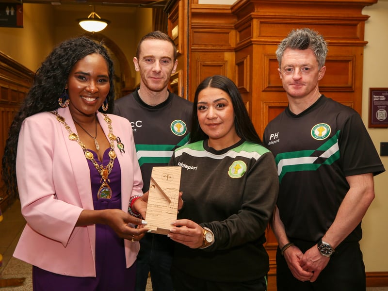 The Mayor of Derry and Strabane, Councillor Lilian Seenoi-Barr with club coaches Ciaran McCloskey, Caoili Bradley and Pajo Hamilton.