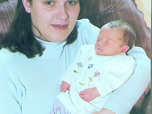 Use the Next > above or below to go through the gallery Caption: 2001 - New Year Baby: Baby Chloe Kate, a daughter of Aidan and Caroline Doherty from Kinard, Legan was born at 12.03pm on January 3 and is a younger sister for her brother Stephen, aged six Picture: Joe McDonagh