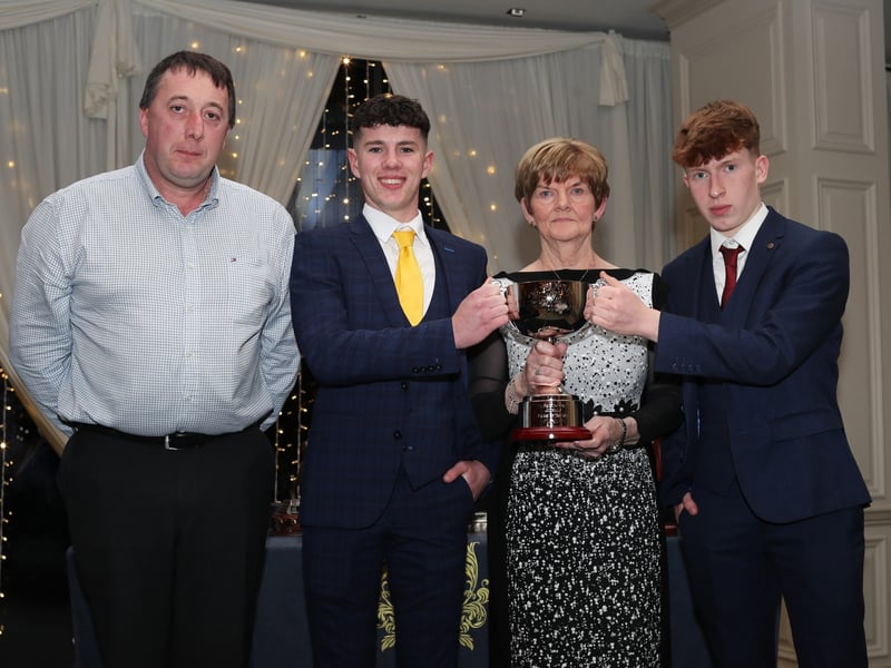 Caption:  Anna-Mai McNamee presents the Frank McNamee memorial trophy to U16 joint players of the year Oisin Kane & Sean Gibbons with St. Vincent's minor chairperson Derek McKeon also in the picture. Photo: Syl Healy.