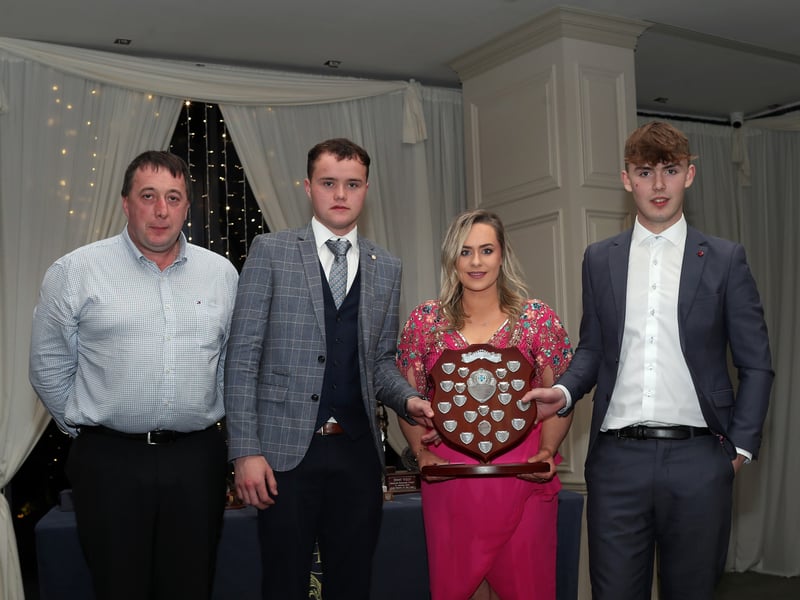 Caption:  Brona Brady presents the Sean Brady memorial trophy to joint minor player's of the year Aaron Brady & Kaelum McGee with St. Vincent's chairperson Derek McKeon also in the picture. Photo: Syl Healy.