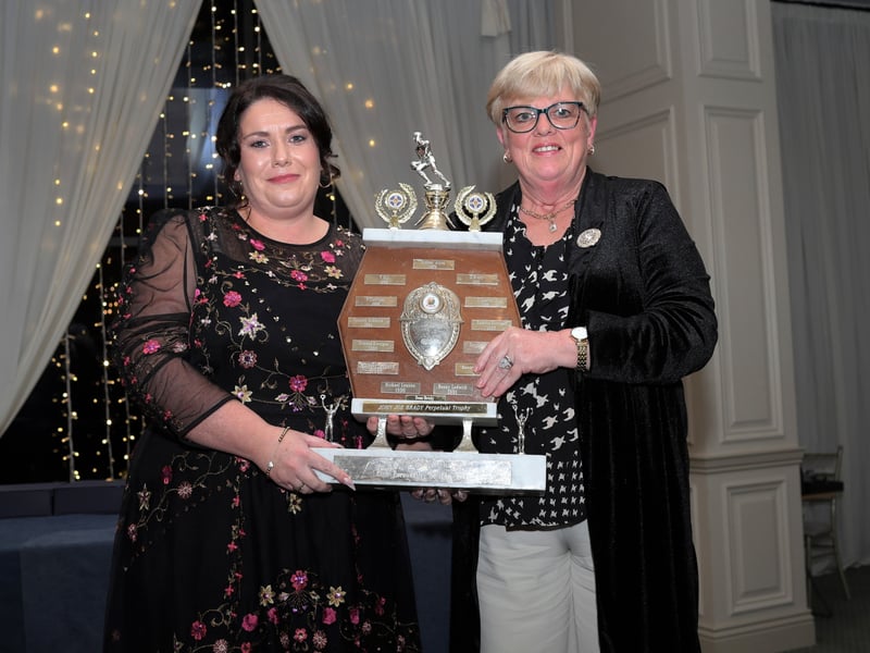 Caption: Kathleen Brady presents the John Joe Brady memorial trophy to Lorraine Corrigan, Fr. Manning Gaels club person of the year 2023. Photo: Syl Healy.
