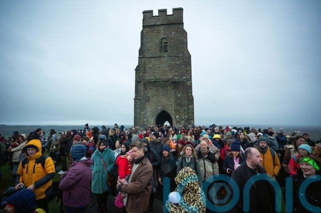 Glastonbury Tor in Somerset is one of the most popular gathering points to mark the event.