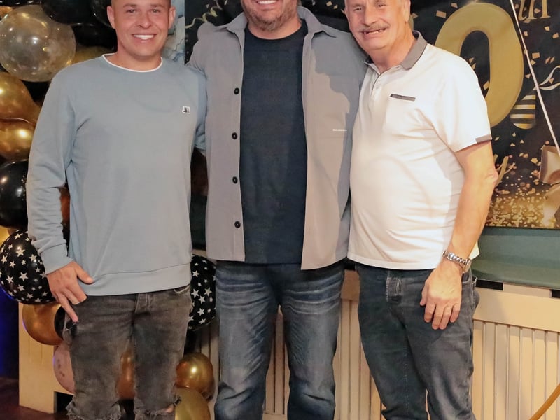 Caption: James, Kevin and Kevin snr