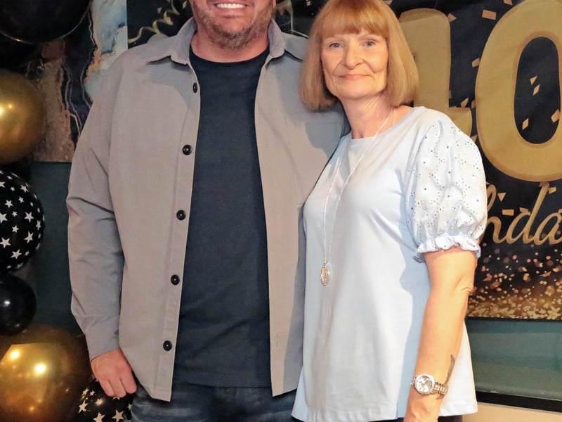 Caption: Kevin Hussey and Godmother Liz Connell