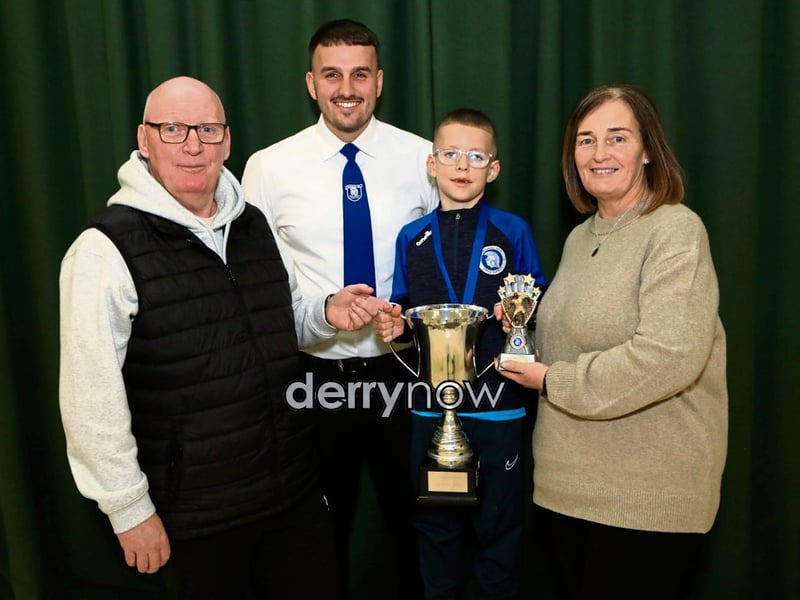 Thomas and Linda Burke presents the "Thomas Burke Award" to Jackson O'Hagan at the Trojans Youth & Community Group annual Youth Presentation of Awards held in St. Cecilia’s College. Included is Diolain Ward.