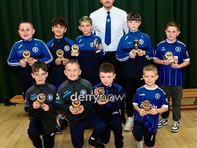 Diolain Ward with "Man of the Match" award winners at the Trojans Youth & Community Group annual Youth Presentation of Awards held in St. Cecilia’s College.