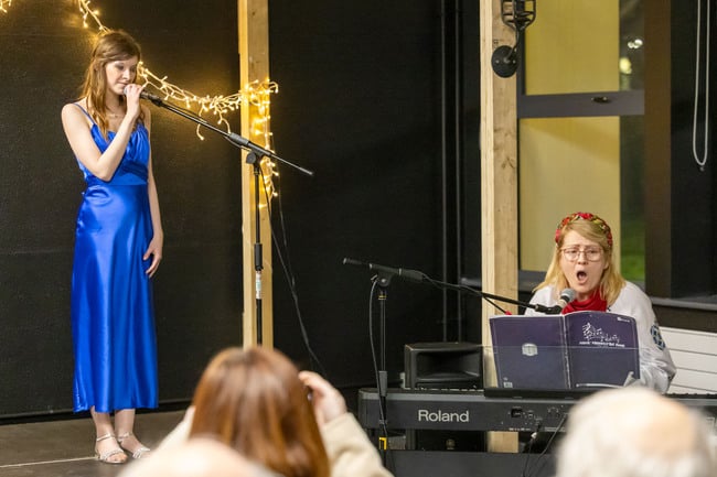 Oksana Biechvaia on piano with Lucy Hood performing at the Laois School of Music and Music Generation Laois Adult Students Christmas Concert in Laois Music Centre.