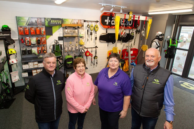 Jimmy Duffy, Angela Kelly and owners Patricia and Austin Handy inside Trade Safety's new shop area.