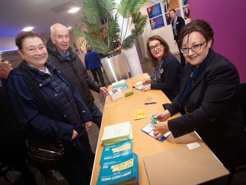 Derry Credit Union staff Karen Doran and Joanne Barr pictured with Gerard and Ellen Breslin at Monday's AGM at St. Mary's College, Derry.