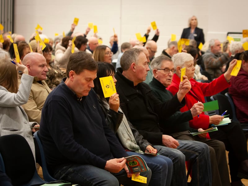 Members voting at Monday night's Derry Credit Union AGM.