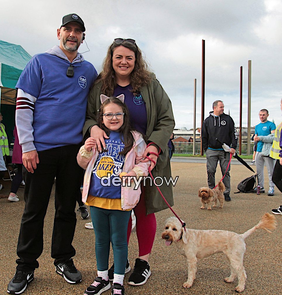 Gary Rutherford pictured with his wife Sarah, Zoey his daughter and Harley the cockapoo at ARC Fitness Recovery Walk.