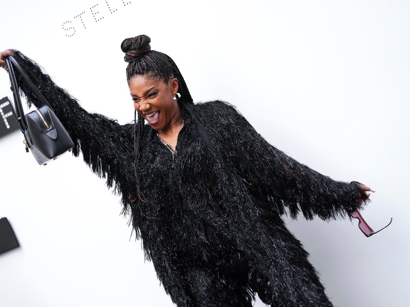 American comedian and actor, Tiffany Haddish, cheered with her new Stella Ryder bag in a black fringed two-piece. Her ensemble mirrored the raven – a key source of inspiration in the collection.
