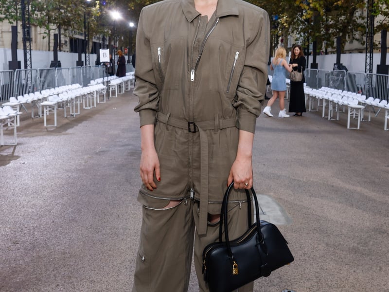 Greta Gerwig, 41, wore a utilitarian jumpsuit by McCartney, with multiple zips and the designer’s classic Eighties shoulder pads. The American director carried the Stella Ryder shoulder bag.