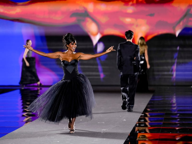 U.S TV star Aja Naomi King, 39, channelled Dior in a black drop waist tulle ballet gown. The actor paid homage to the Sixties with a sleek and sophisticated beehive hair do.