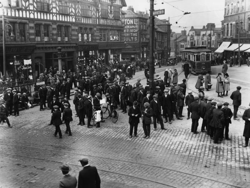 Striking miners in the market place, Wigan, in April 1921