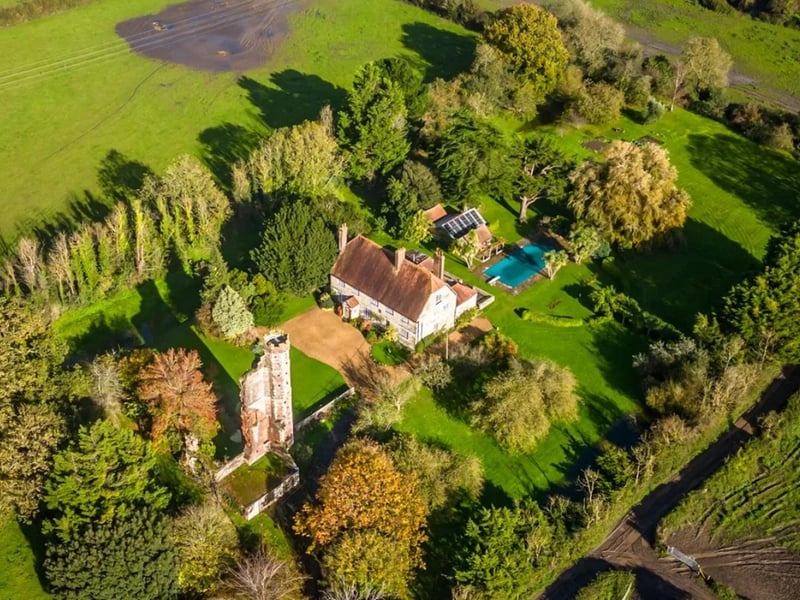 Look inside this unique house - which comes with a castle. 