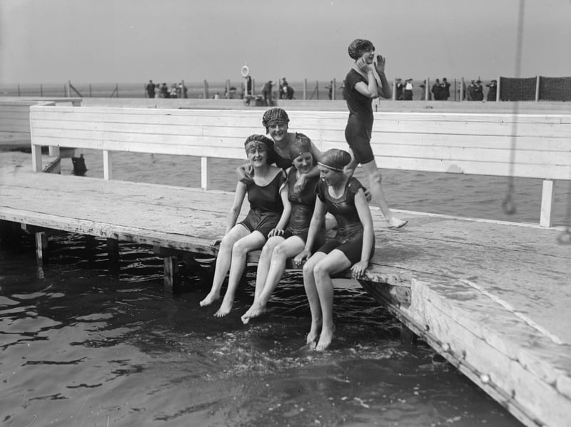 Bathers at the lido in Southport, Lancashire, dip their feet in the water in June 1918