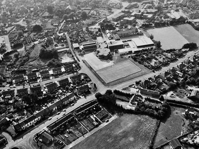 Wellington’s New College dominates this aerial view from September 1983, showing the expanded campus that had developed from the former Girls’ High School to serve sixth-form students from across Telford. Regent Street can be seen in the foreground, offering a snapshot of the town’s changing educational landscape at the time.
