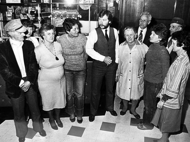 Wellington’s Clifton Cinema on its final day in April 1983, as morning staff gather in the foyer with manager Duncan Willmott for one last chat before the doors closed. The closure came despite an estimated 30,000-strong petition to save the town’s only purpose-built cinema, which had been sold to a supermarket firm. The final programme included comedies Hot Bubblegum and Going Steady, with Tootsie narrowly missing out as the closing film. The cinema later reopened in altered form before closing again in years that followed.