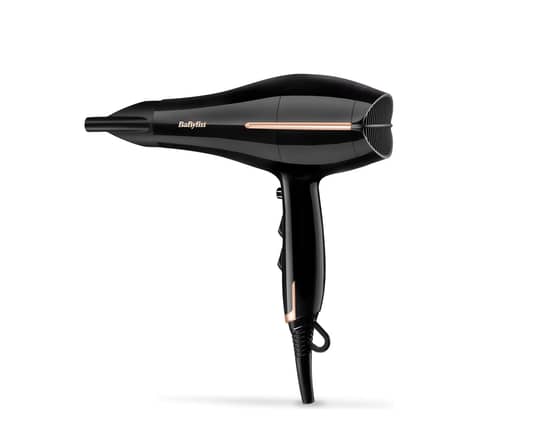 “Start by blow-drying your fringe using a round brush, directing the hair to the sides to create a soft, feathered effect,” says hair expert Armin Morbach. “Then add a texturising powder for volume at the base of your roots. This will give you lift and help keep your fringe looking fresh and bouncy throughout the day. For added texture, you can also lightly twist sections of your fringe with your fingers after applying the powder.”