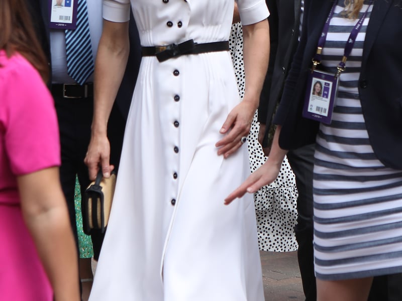 Kate sported a white tiered dress by the British brand, Temperley, paired the her with a Stuart Weitzman Muse Clutch. Often gravitating toward tennis whites, the Princess emulated the look in 2012, 2014 and 2019.